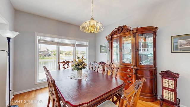 23118 Lacroix Ln, Plainfield, IL 60544 - dining room featuring a chandelier and light wood-type flooring