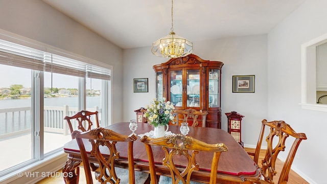 23118 Lacroix Ln, Plainfield, IL 60544 - dining space featuring a chandelier and light wood finished floors