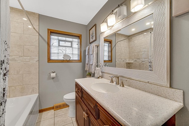 2327 W 157th Pl, Markham, IL 60428 - full bathroom featuring vanity, baseboards, toilet, tile patterned flooring, and  shower combination