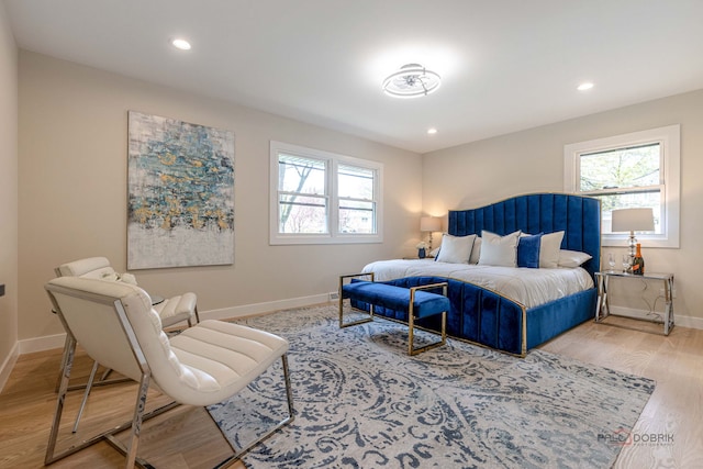bedroom featuring recessed lighting, baseboards, and wood finished floors