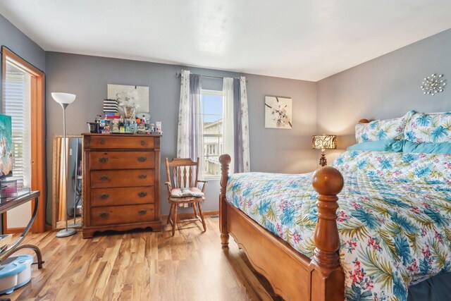 143 Foxglove Unit 143, Romeoville, IL 60446 - bedroom featuring wood finished floors