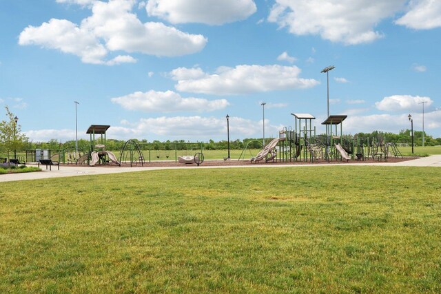 143 Foxglove Unit 143, Romeoville, IL 60446 - community jungle gym featuring a lawn