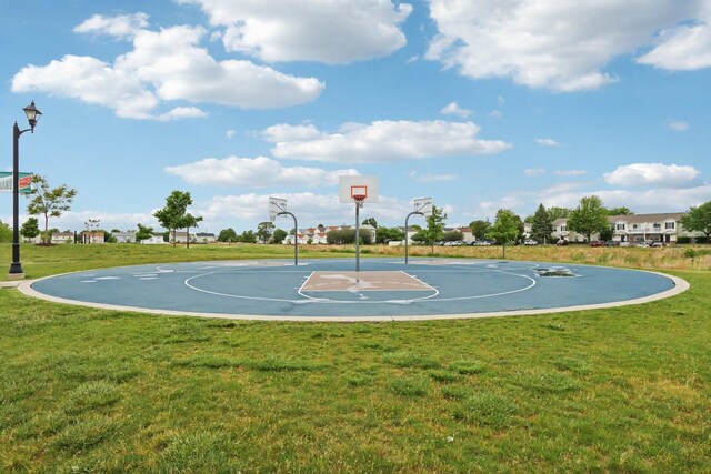 143 Foxglove Unit 143, Romeoville, IL 60446 - view of basketball court with a yard and community basketball court