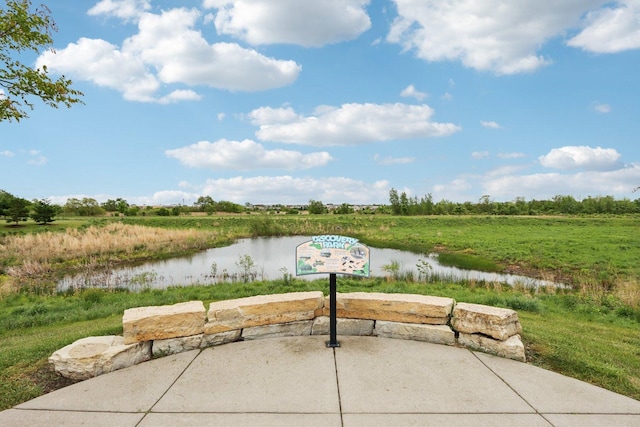 143 Foxglove Unit 143, Romeoville, IL 60446 - view of patio / terrace with a water view and a rural view
