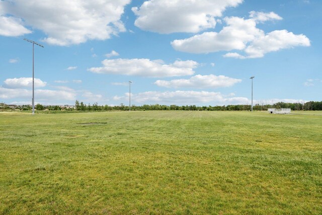 143 Foxglove Unit 143, Romeoville, IL 60446 - view of grassy yard with a view of countryside