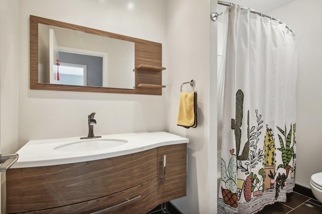 full bath featuring vanity, tile patterned flooring, toilet, and a shower with shower curtain