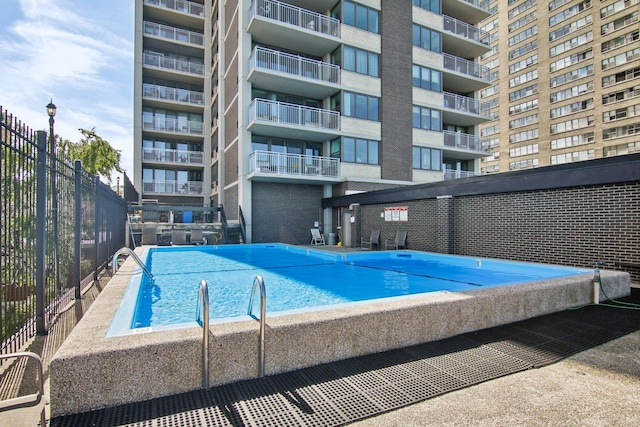 pool featuring fence