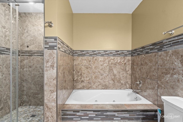 410 Blue Ridge Dr, Oswego, IL 60543 - bathroom featuring tile walls, a shower stall, toilet, and a jetted tub