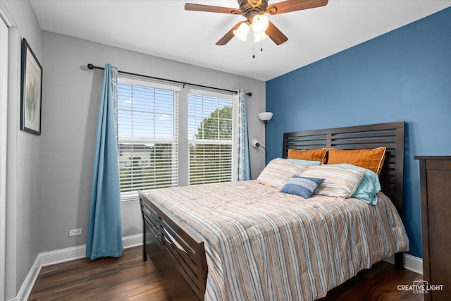 410 Blue Ridge Dr, Oswego, IL 60543 - bedroom featuring dark wood-style floors, baseboards, and ceiling fan