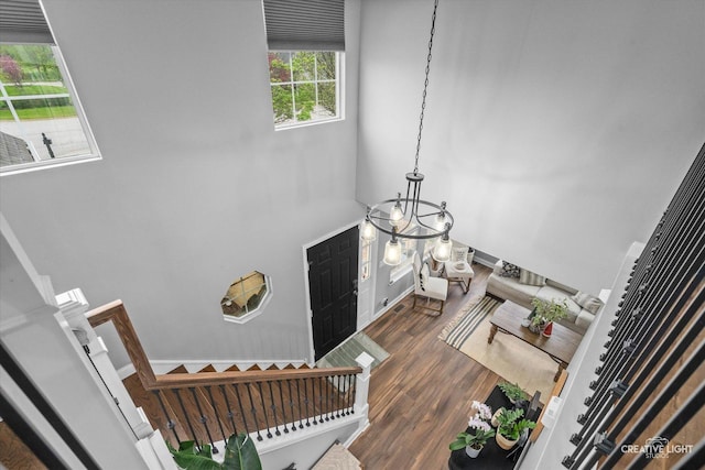 410 Blue Ridge Dr, Oswego, IL 60543 - entryway featuring dark wood finished floors and a chandelier