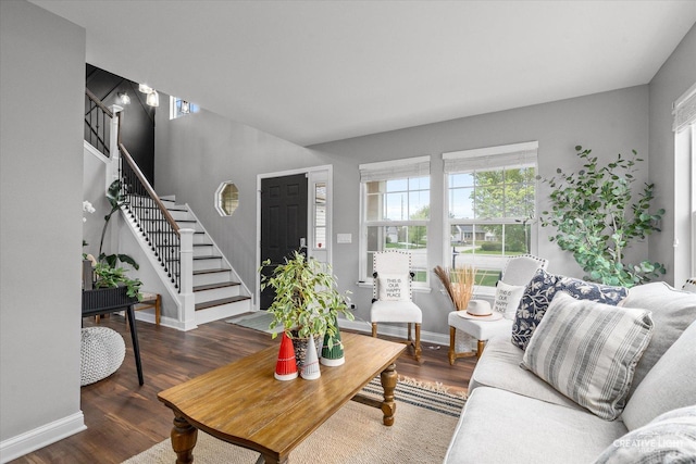 410 Blue Ridge Dr, Oswego, IL 60543 - living room with stairs, plenty of natural light, wood finished floors, and baseboards