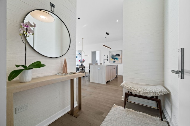 hallway featuring recessed lighting and wood finished floors