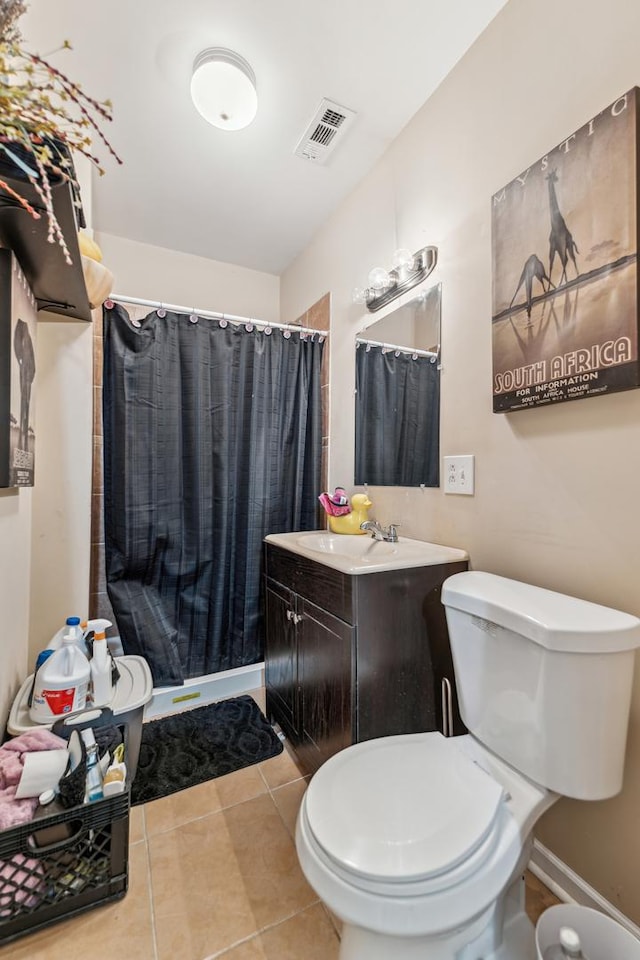 bathroom featuring tile patterned flooring, vanity, toilet, curtained shower, and visible vents