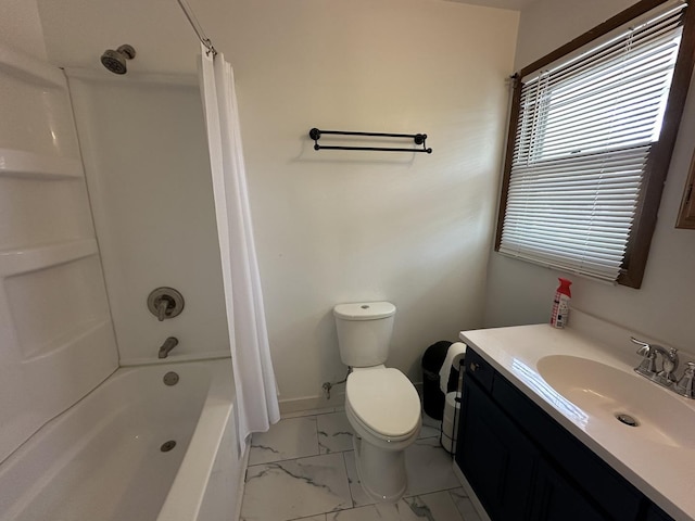 bathroom featuring vanity, shower / tub combo with curtain, toilet, marble finish floor, and baseboards
