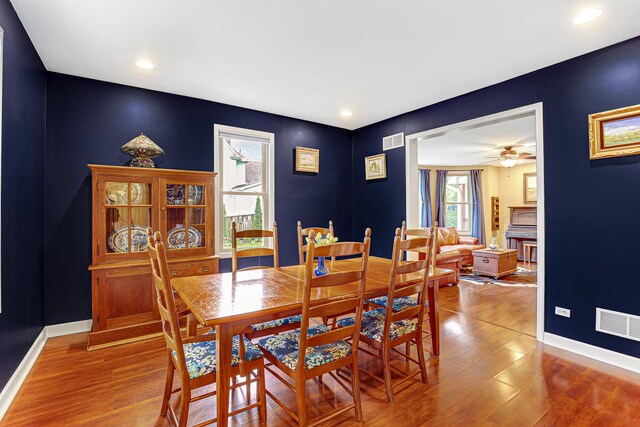 1208 Main St, Crete, IL 60417 - dining area with visible vents, baseboards, and wood finished floors