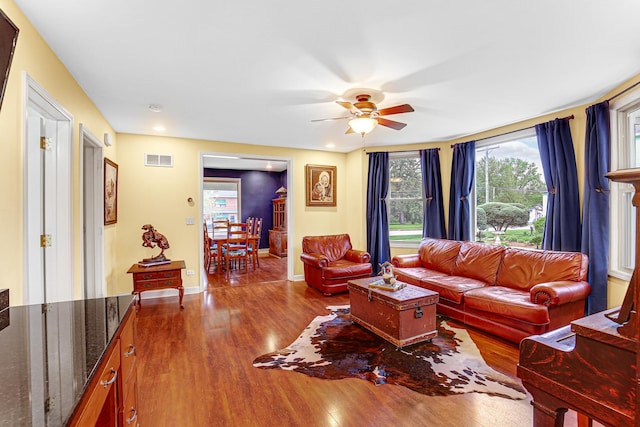 1208 Main St, Crete, IL 60417 - living room featuring visible vents, wood finished floors, baseboards, ceiling fan, and recessed lighting