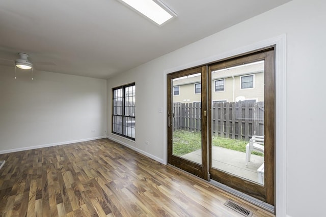 4140 Brentwood Ln, Waukegan, IL 60087 - doorway with wood finished floors, baseboards, and a ceiling fan