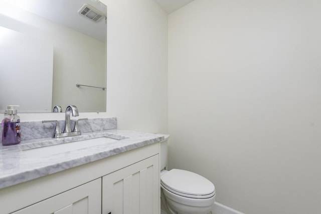 4140 Brentwood Ln, Waukegan, IL 60087 - bathroom with toilet, vanity, and baseboards