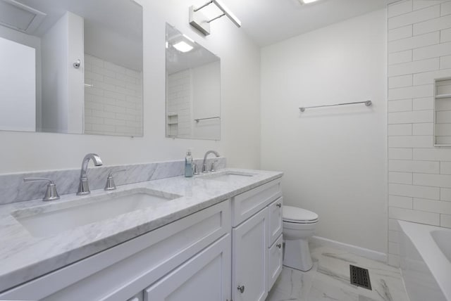 4140 Brentwood Ln, Waukegan, IL 60087 - full bath with toilet, marble look tile flooring, double vanity, and baseboards