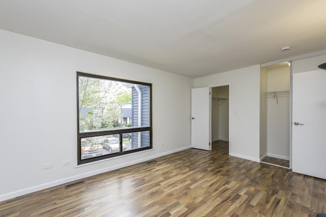 4140 Brentwood Ln, Waukegan, IL 60087 - unfurnished bedroom featuring wood finished floors and baseboards