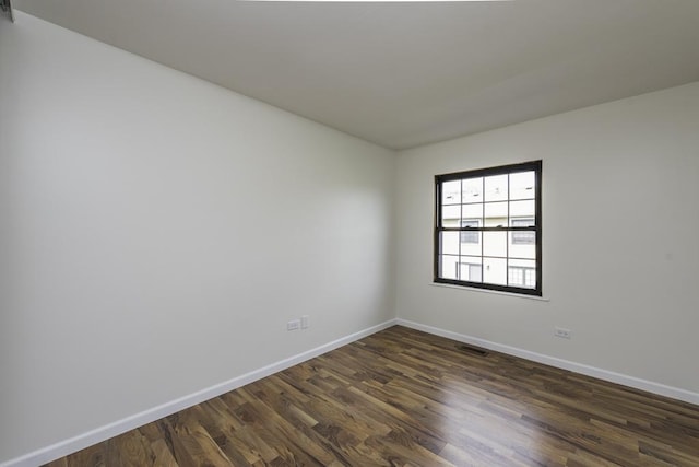 4140 Brentwood Ln, Waukegan, IL 60087 - unfurnished room with dark wood-style floors and baseboards