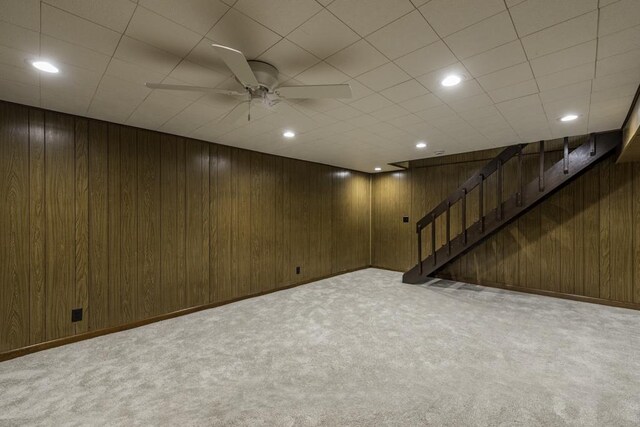4140 Brentwood Ln, Waukegan, IL 60087 - finished basement with carpet flooring, stairs, wood walls, recessed lighting, and ceiling fan