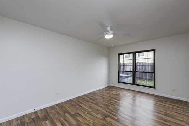 4140 Brentwood Ln, Waukegan, IL 60087 - unfurnished room featuring baseboards, dark wood finished floors, and a ceiling fan