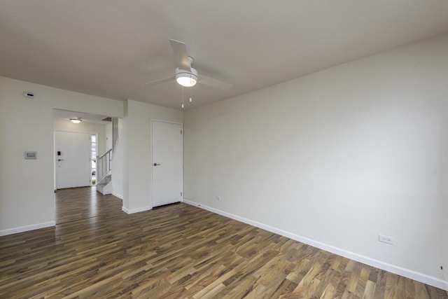 4140 Brentwood Ln, Waukegan, IL 60087 - unfurnished room featuring dark wood-type flooring, a ceiling fan, and baseboards