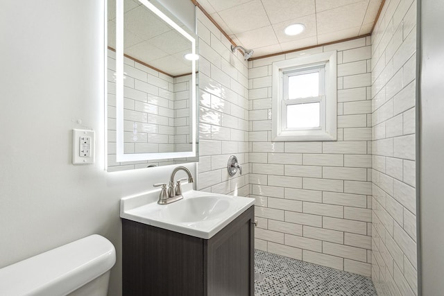 14835 Kildare Ave, Midlothian, IL 60445 - bathroom with toilet, recessed lighting, tiled shower, and vanity