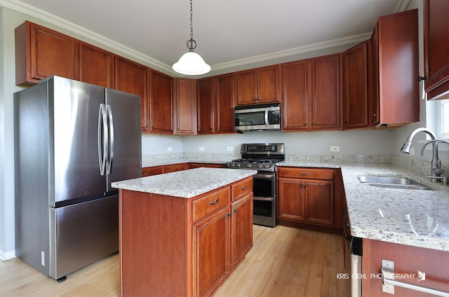 13464 W Hidden Springs Trl, Wadsworth, IL 60083 - kitchen with a center island, light stone counters, a sink, light wood-style floors, and stainless steel appliances