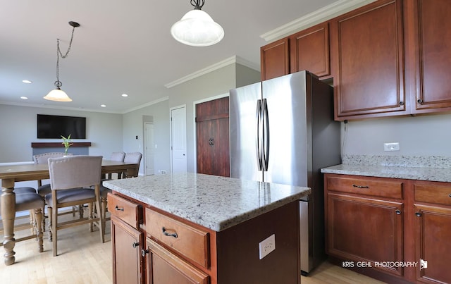 13464 W Hidden Springs Trl, Wadsworth, IL 60083 - kitchen featuring freestanding refrigerator, decorative light fixtures, and light wood finished floors