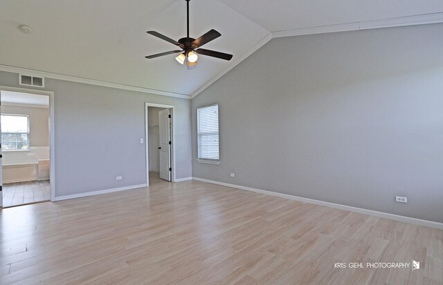 13464 W Hidden Springs Trl, Wadsworth, IL 60083 - interior space with visible vents, baseboards, ceiling fan, light wood-style floors, and lofted ceiling