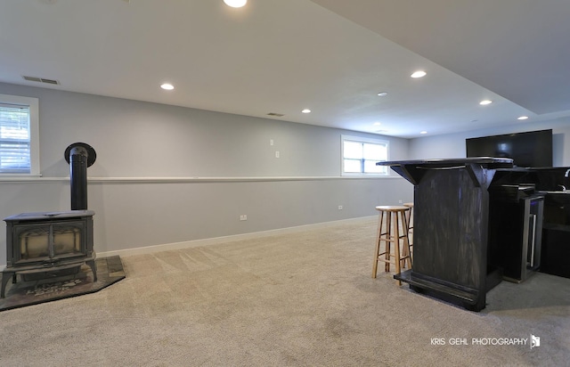 13464 W Hidden Springs Trl, Wadsworth, IL 60083 - bar featuring a bar, visible vents, baseboards, light colored carpet, and recessed lighting