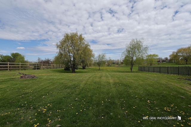 13464 W Hidden Springs Trl, Wadsworth, IL 60083 - view of yard with a rural view and fence