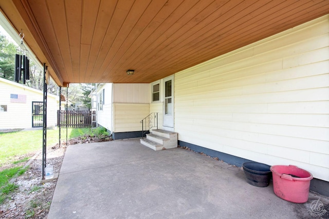 view of patio / terrace with fence and entry steps
