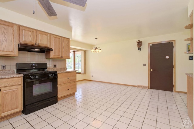 kitchen featuring light brown cabinetry, black gas range oven, tasteful backsplash, under cabinet range hood, and visible vents