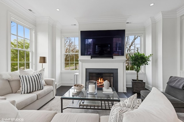 847 N Mckinley Rd, Lake Forest, IL 60045 - living area with wood finished floors, healthy amount of natural light, a lit fireplace, baseboards, and recessed lighting
