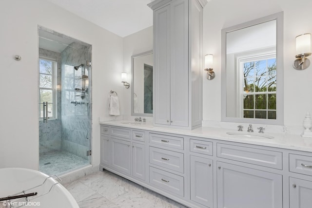 847 N Mckinley Rd, Lake Forest, IL 60045 - bathroom featuring a shower stall, double vanity, a freestanding tub, and marble finish flooring