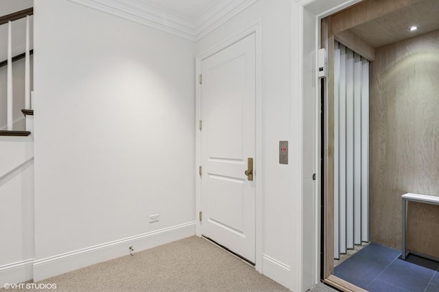 847 N Mckinley Rd, Lake Forest, IL 60045 - hallway with elevator, crown molding, and carpet floors