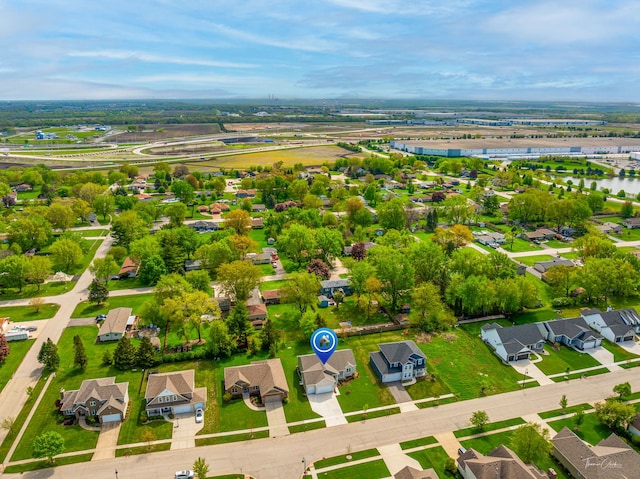 aerial view of residential area with a nearby body of water