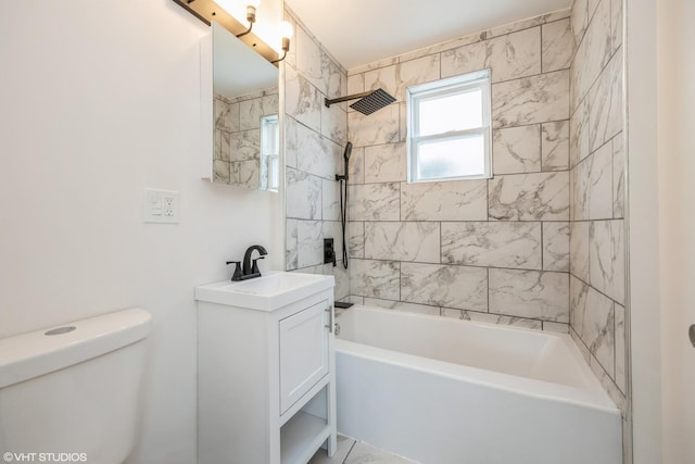 full bathroom with shower / bath combination, vanity, and toilet