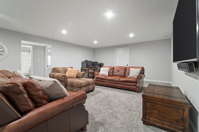carpeted living area featuring recessed lighting