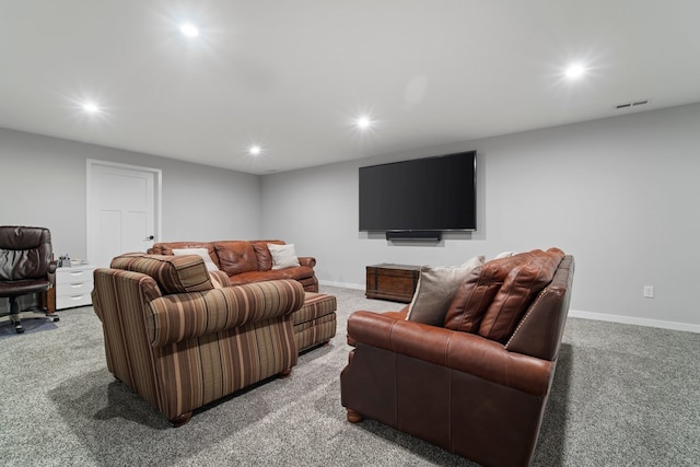 living area with light colored carpet, baseboards, visible vents, and recessed lighting