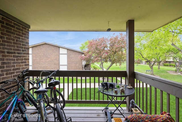 deck featuring a lawn