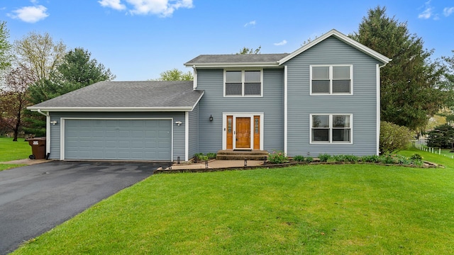 4401 Windsor Ct, Loves Park, IL 61111 - view of front of property featuring a shingled roof, an attached garage, a front lawn, and aphalt driveway