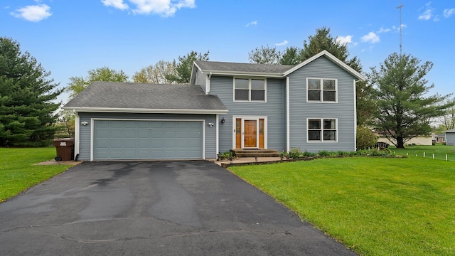 4401 Windsor Ct, Loves Park, IL 61111 - view of front of property with an attached garage, driveway, and a front lawn
