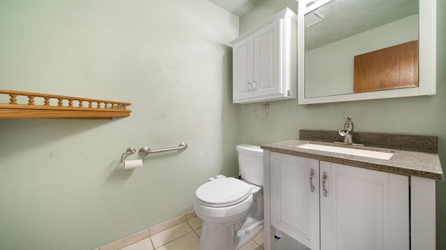 4401 Windsor Ct, Loves Park, IL 61111 - half bathroom with vanity, tile patterned flooring, baseboards, and toilet