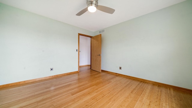 4401 Windsor Ct, Loves Park, IL 61111 - spare room with ceiling fan, visible vents, baseboards, and wood finished floors