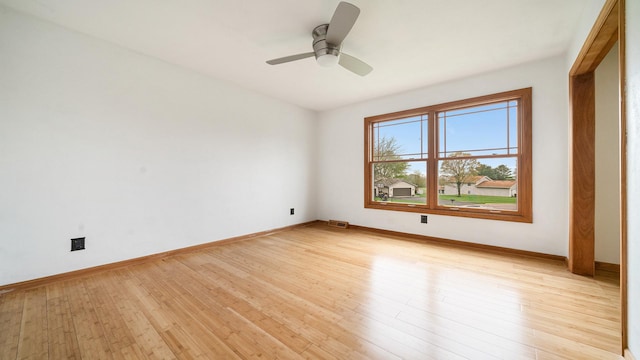 4401 Windsor Ct, Loves Park, IL 61111 - empty room with a ceiling fan, baseboards, visible vents, and light wood-type flooring