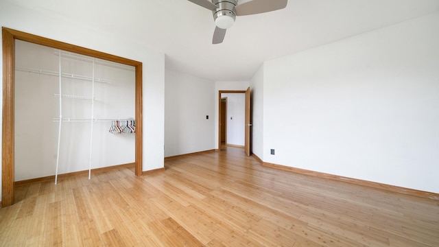 4401 Windsor Ct, Loves Park, IL 61111 - unfurnished bedroom with baseboards, ceiling fan, a closet, and light wood-type flooring
